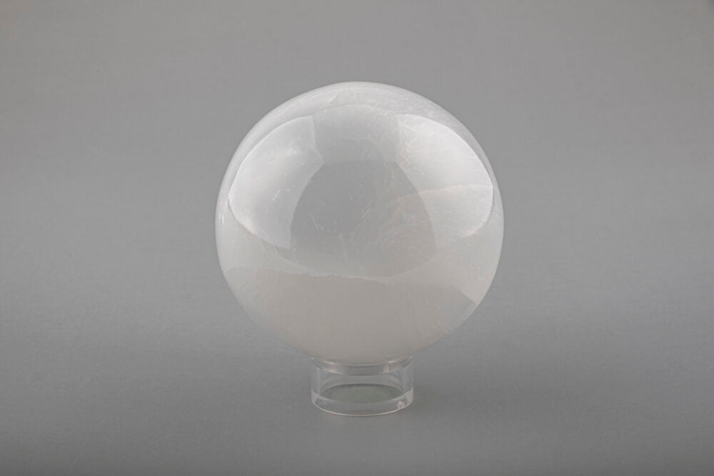 7cm Selenite  Sphere with a free plastic stand
